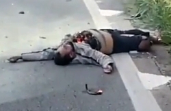 Aftermath of a fatal accident between a motorcyclist and a bus