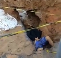 A motorcyclist died after falling into a work hole