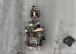 UA drone drops a grenade straight into the back of a moving tractor