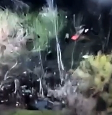 Mortar shell goes off in front of RU soldiers carrying a stretcher