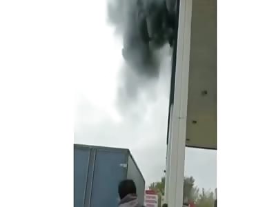 Woman throws herself off a bridge to escape a fire.