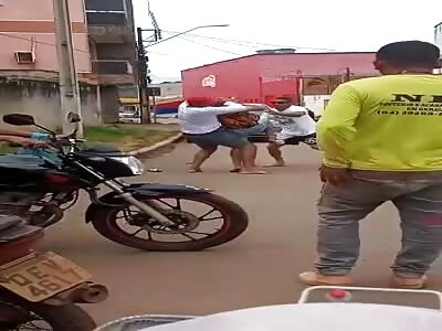 Man is immobilized and beaten with bottles and stones