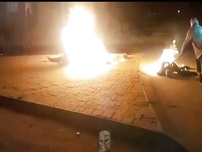 Human cruelty, crying men burned alive