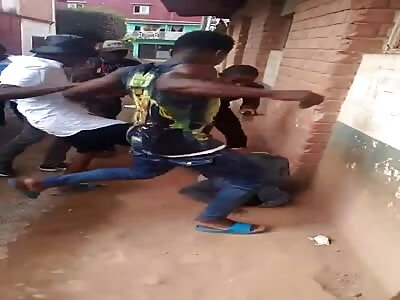 crying thief being beaten