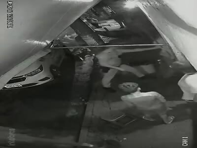 policeman hit in the head with a gas canister