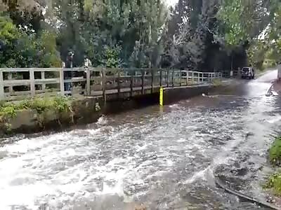 biker crashes when falling from puddle