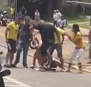 Man cruelly kicked by a giant man