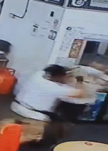 Old man pushed into Chinese pastry