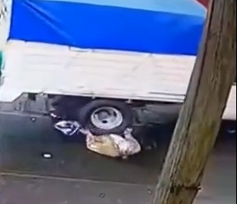 Elderly woman hit by truck