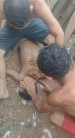 Rival gangster transported in cart decapitated