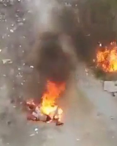 the man was set on fire in a vacant lot