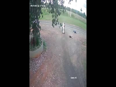 biker flies when colliding into the side of a car