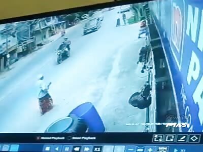 The woman gets knocked down.