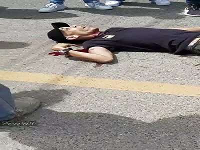 thief is shot in the street