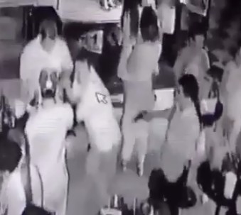 Man Being Executed with a Headshot at Night Club