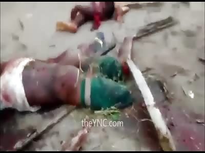 Rapist Being Dismembered W/ Axe And with a Machete Shoved in His ass