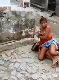 No Top? Who Cares..Girl still Delivers an Ass Whooping 