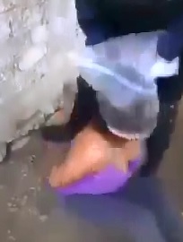 Female Soldier Tortures by Suffocation on Another Woman 