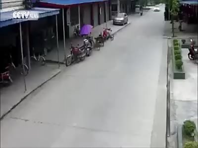 Little Boy is Struck by Car in the Street 
