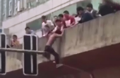 Suicidal Man is Beaten Off of the highway Overpass..He's in the Hospital in Critical Condition