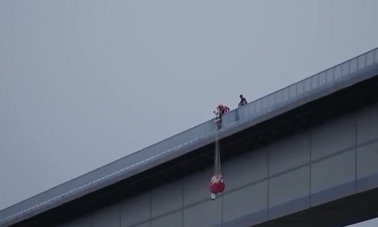 WOW: Professional Base Jumper saves a Man's Life Seconds before he jumps to his Death from Bridge 