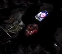 Agonizing Dying Thief is stomped many times in the head and filmed by people