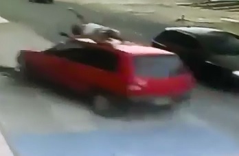 Watch the Bicyclist in the White T-Shirt