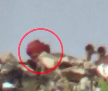 Sniper Blows Off the Head of Man wearing a Red Tourbon 