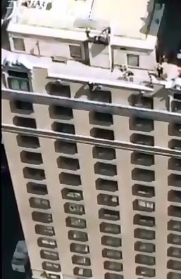 Suicide in Manhattan caught on Camera...Body Bounces when it Hits the Concrete of the Street  (Slow Motion Added) 