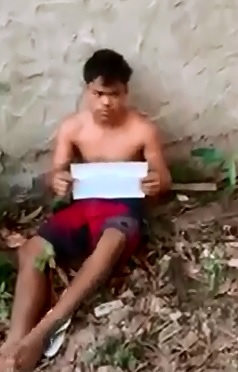 Younger Boy holding Sign gets Beating from Gangsters 