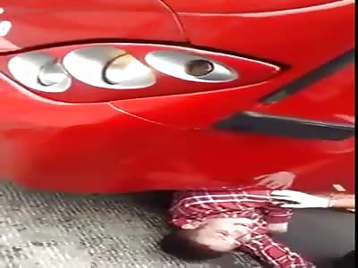 Teenager Screaming Bloody Murder Stuck under a Bus 