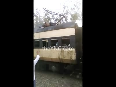 Witness this Man Kill Himself by Electrocution...On TOp of a Train 