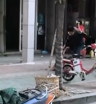 Wtf Man..Horror Movie?  Wife is Hacked with a hatchet in the Street by a Mask Wearing Maniac Swings Away