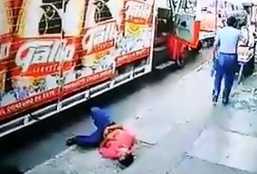 Hitman  puts Bullet in Man Unloading Beverage Truck 