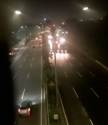 Kids Standing on Bridge Closeest to Man who Kills Himself from Highway Street Pole 