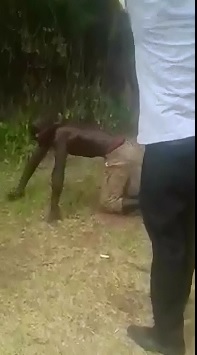 Bloodied Up thief gets his Ass Whooped with the Non-Business End of an Ax