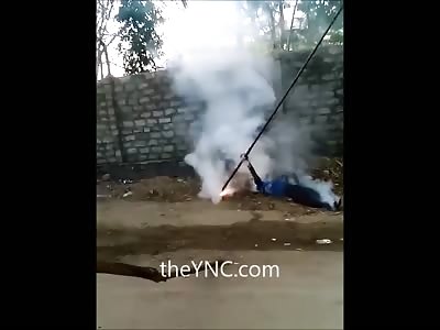 Working Man is Electrocuted to Death Stuck Gripping Metal Rod 