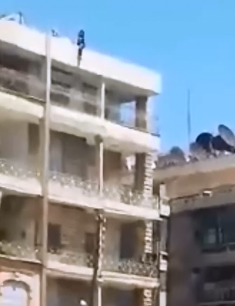 Suicide Girl Straddles Roof then Jumps to Her Death 