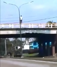 Onlooker Records Effective Suicide by Jump and Truck 