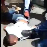 Thief Caught and Beaten.... Woman Comes to His Rescue