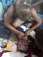 Bitch Steals Mans Gold Chain While He Agonizes to Death