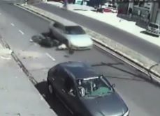 Motorcyclists Head vs. Car Wheel