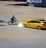 Race Car Ends Bicyclist 