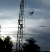 Suicide Jumper Leaps Before People Climbing up can Reach Him