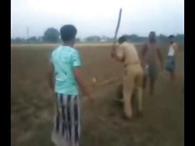 Police Beat a Kid with Stick