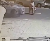 Old man struck by car while crossing the street