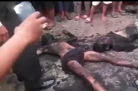 Curious Kids Watching Two Dying Thugs After Beaten and Burned