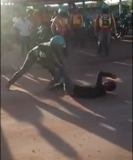 Thief Beaten in Street with Sticks