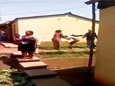 Woman humiliates young husband's lover in front villagers