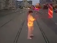 Woman Distracted by Her cell Phone is Run over by Train